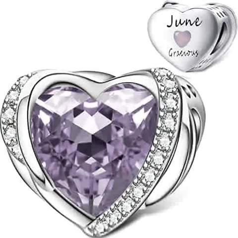 Heart-shaped purple gemstone charm with silver border on a white background