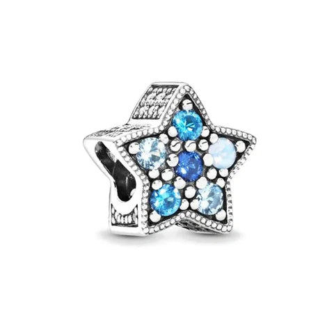 Heart-Shaped Hanging Charm with Blue Crystals and Silver Detailing - Heart-shaped sterling silver hanging charm with blue crystals and intricate heart detailing for a romantic, feminine look.