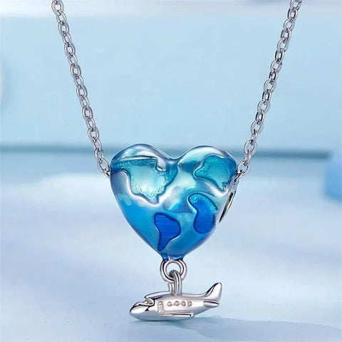 Heart Traveler Globe and Airplane Charm