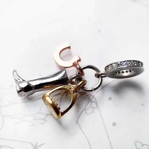 Assorted metal charms.