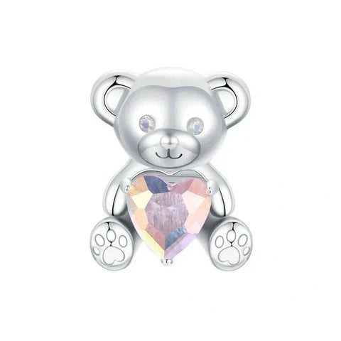 Silver teddy bear charm with iridescent heart.