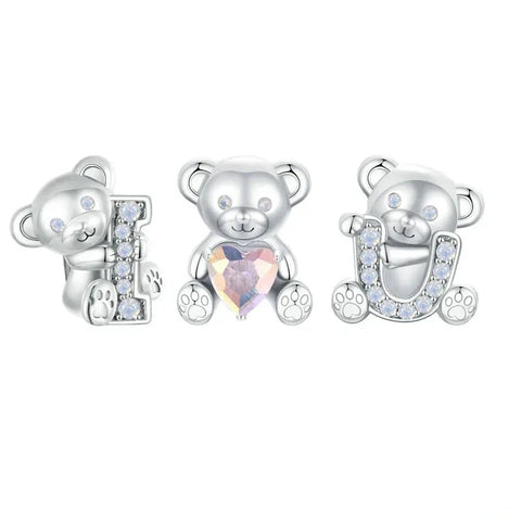 Silver teddy bear charms.