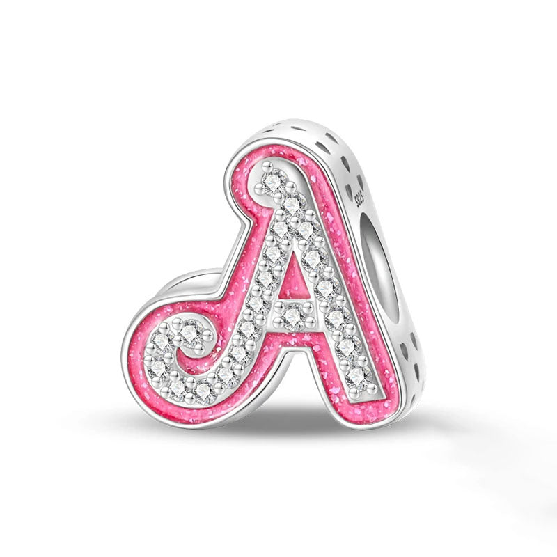 A sterling silver "A" initial charm with pink enamel and zirconia accents, perfect for adding a personalized touch to jewelry.