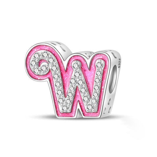 A sterling silver "W" initial charm with pink enamel and zirconia accents, perfect for adding a bold personal touch to jewelry.