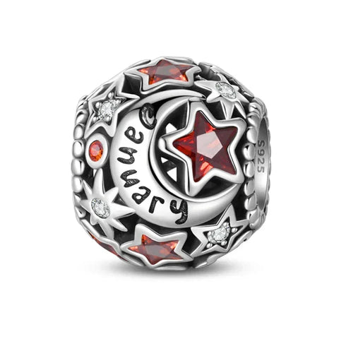 Silver charm with red stars and 'January' inscription.