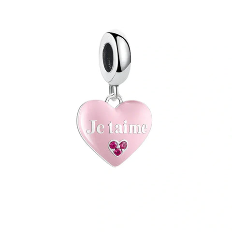 Pink heart charm with silver accents.