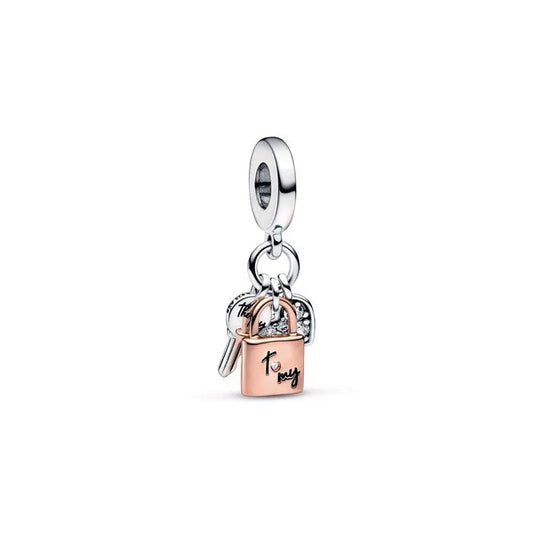 Key and padlock heart triple dangle charm in Pandora Rose, a symbolic and intricate accessory