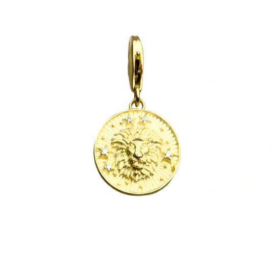 Gold lion pendant with embedded crystals.