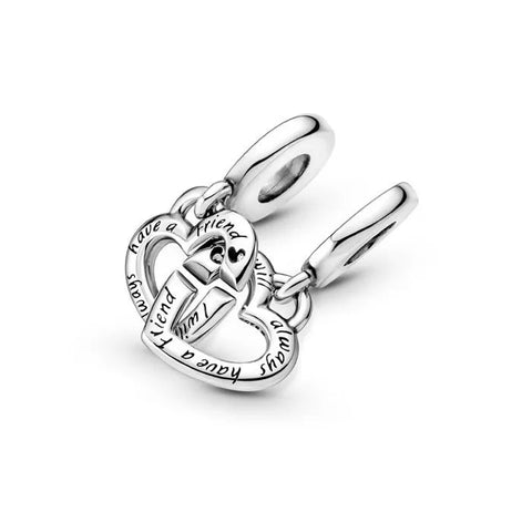 Sterling silver charm with two interlocking hearts engraved with "Sister" and "Sis.
