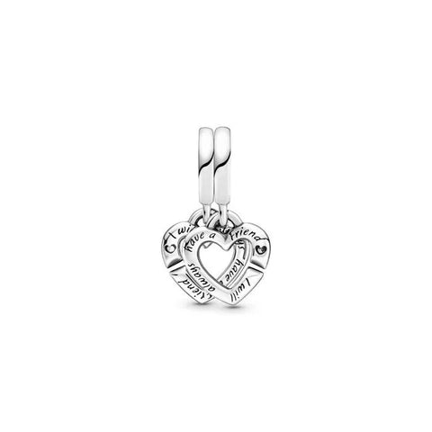 Sterling silver charm with two interlocking hearts engraved with "Sister" and "Sis.