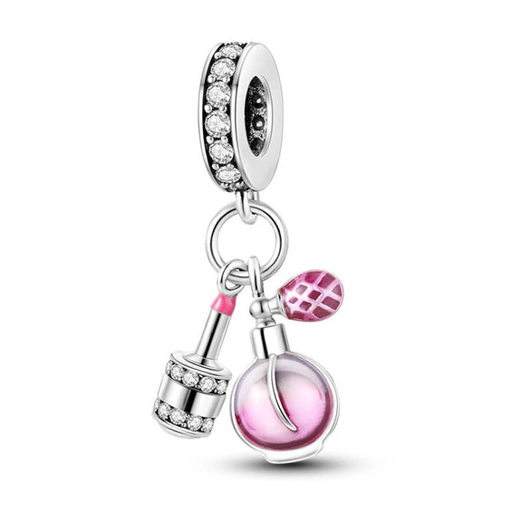 Silver Lipstick and Perfume Charm - Silver lipstick and perfume charm with pink enamel and stones.