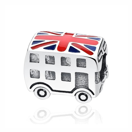 Silver-tone double decker bus charm with red and blue Union Jack enamel on the roof and carved window details on the body