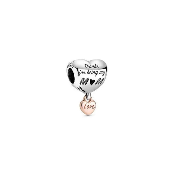 Love You Mom Heart Charm - pandora Rose - Mom heart charm with "Love You" design in Pandora Rose, adds warmth and affection to charm bracelets