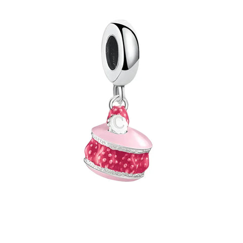 Pink macaron charm.