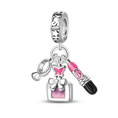 Sterling Silver Makeup and Bow Charm - A sterling silver charm with a lipstick, butterfly bow