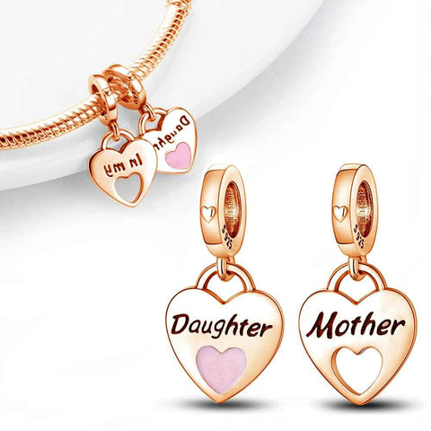 Mother Daughter Heart Charm - Symbol of Love and Bond - Mother Daughter Heart Charm in rose gold with pink enamel, engraved with "Mother" and "Daughter". Perfect for symbolizing a strong family bond.