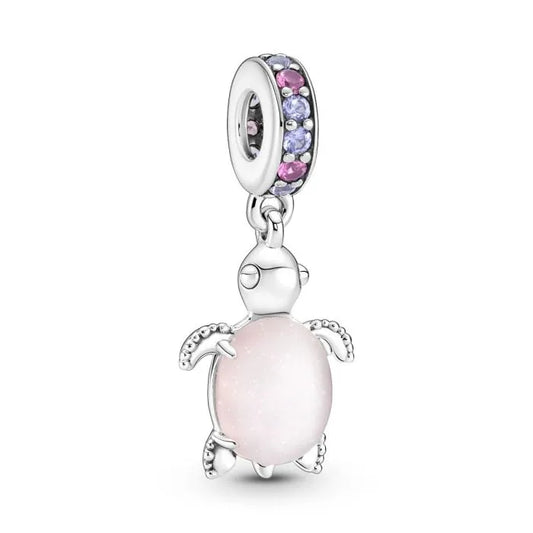 Pink Murano glass sea turtle dangle charm, a charming addition compatible with bracelets