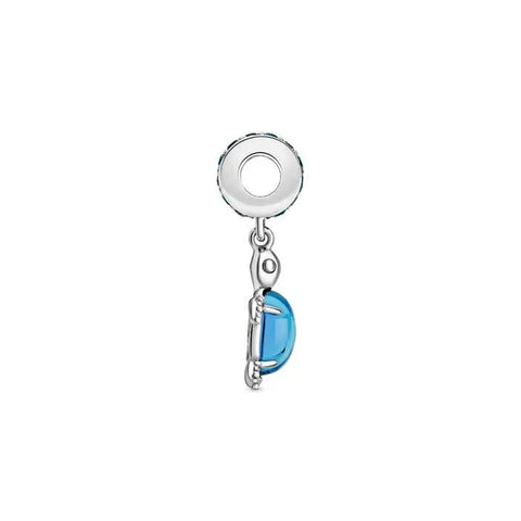 Sterling silver sea turtle charm with a blue crystal-adorned shell for a playful, ocean-inspired design.