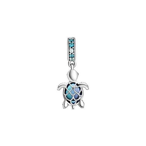 Sterling silver sea turtle charm with a blue crystal-adorned shell for a playful, ocean-inspired design.