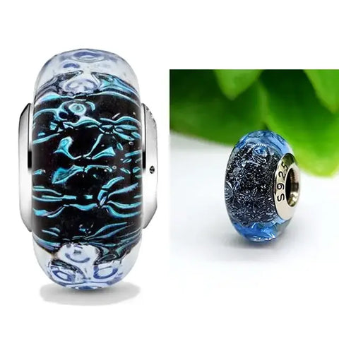 Green opalescent charm, a fresh and calming addition suitable for enhancing charm bracelets