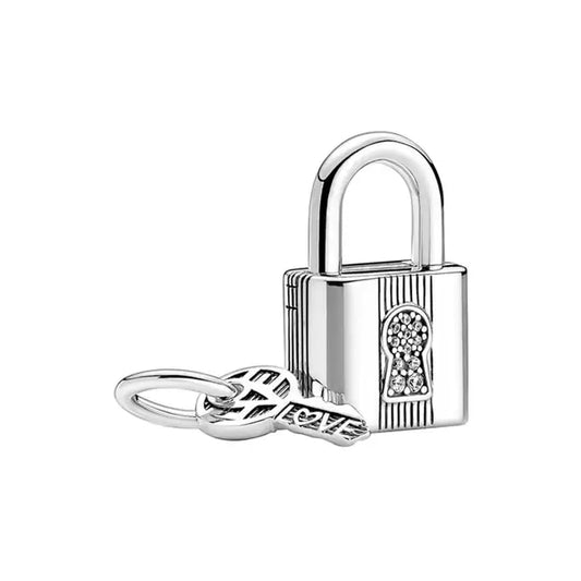 Padlock Key Dangle Charm Pandora Shine - Secure padlock and key charm in Pandora Shine, symbolizing lasting bonds.