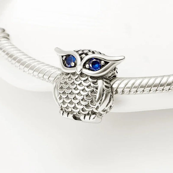 Owl Charm with Sapphire Eyes for Wisdom - Beautiful silver owl charm with sapphire eyes for wisdom, fits Pandora bracelets.