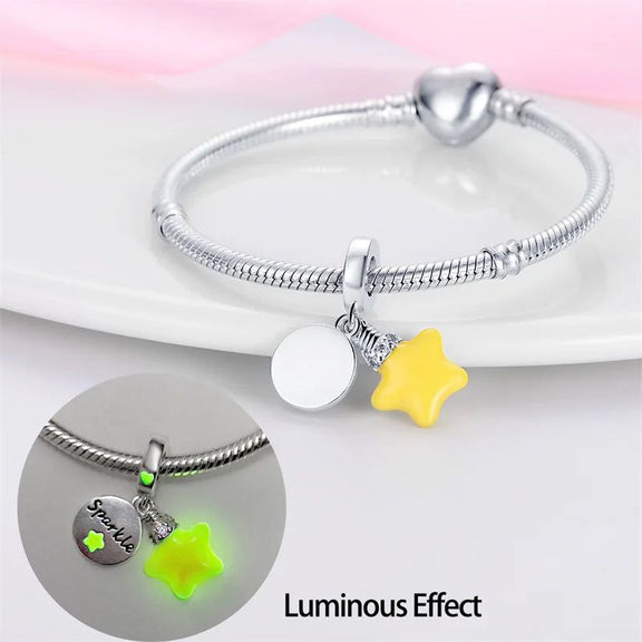 Sterling Silver Sparkle Charm with Yellow Star for Pandora Bracelets - Sterling silver bracelet charm with a yellow star and "Sparkle" inscribed on a round pendant, perfect for Pandora.