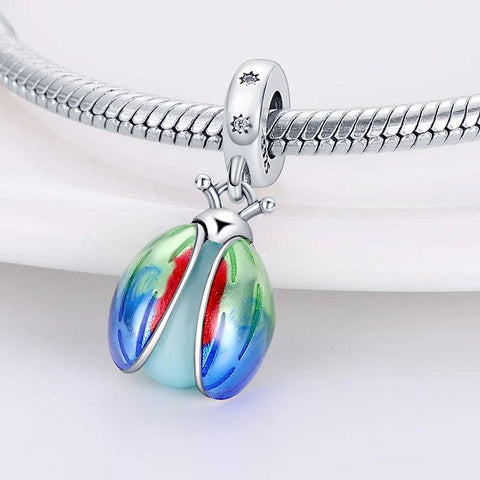 Sterling silver ladybug charm with colorful enamel wings, fits Pandora bracelets.