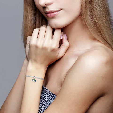 Beautiful ladybug charm with colorful wings in sterling silver, perfect for adding a touch of nature to Pandora bracelets.