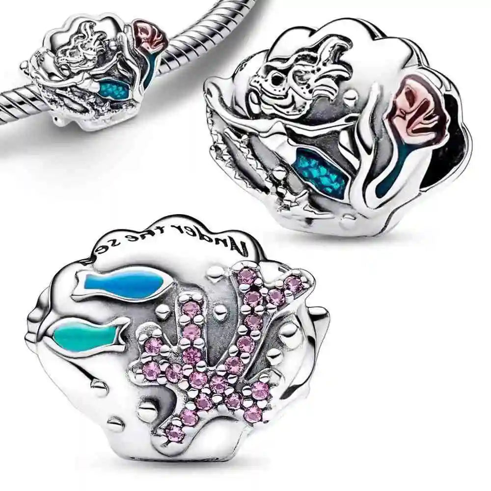 Pandora silver charm featuring Ariel, fish, and corals with blue and pink stone accents.