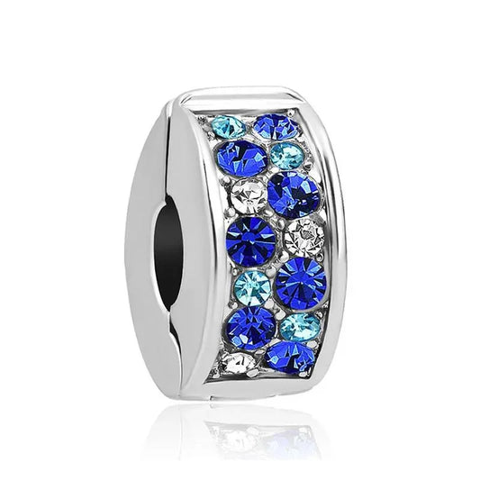 Sterling silver spacer charm with blue and clear crystals for adding sparkle and elegance to any bracelet or necklace.