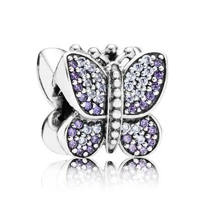 Butterfly Charm with Lavender and Clear Crystals in Sterling Silver - Sterling silver butterfly-shaped charm with lavender and clear crystals for a delicate, nature-inspired design.