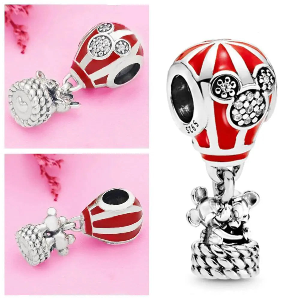 Sterling silver hot air balloon charm with Mickey details and red enamel accents.