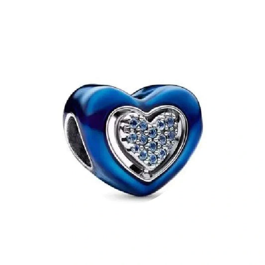 A star-shaped sterling silver charm adorned with deep blue crystals and silver accents, resembling a sparkling night sky.