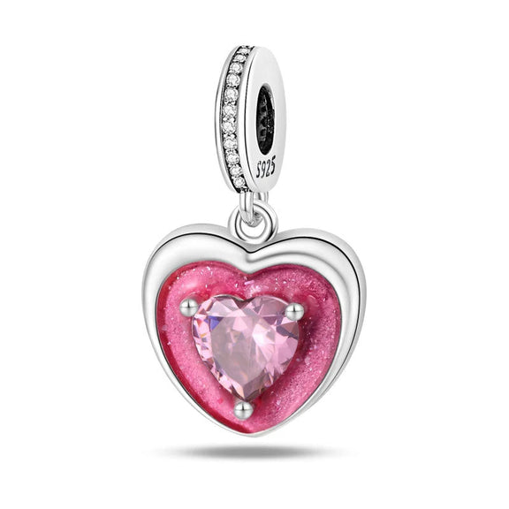 Elegant Pink Heart Charm with a Gemstone - A heart-shaped pink gemstone charm with luxurious detailing, ideal for charm bracelets.