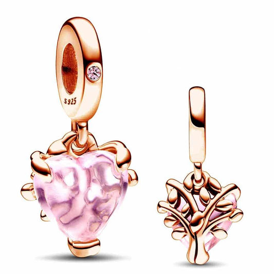 Pink Heart Tree Charm in rose gold with a tree motif growing through a pink enamel heart. Represents love, growth, and strength.