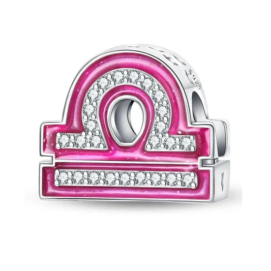 Pink and silver Libra charm.