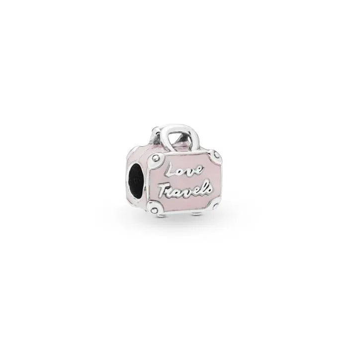 Pink Travel Bag Charm - Stylish pink travel charm in the shape of a bag, ideal for wanderers and travel-themed jewelry.