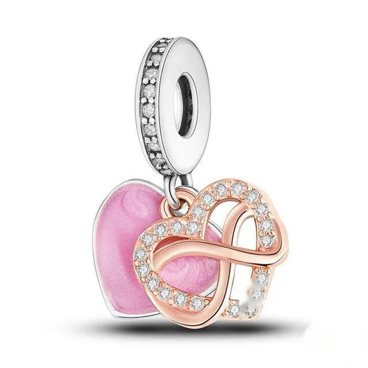 Pink crystal and enamel heart dangle charm with rose gold accents