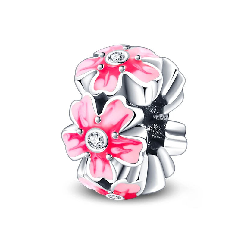 A sterling silver charm with pink enamel flowers and sparkling zirconia centers.