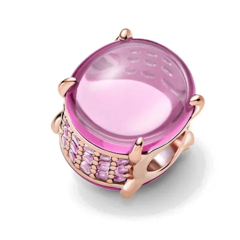 Pink rose quartz charm in rose gold-plated sterling silver, offering a romantic and feminine look.