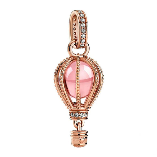 Floating lock charm in rose gold with pink sapphire and diamonds