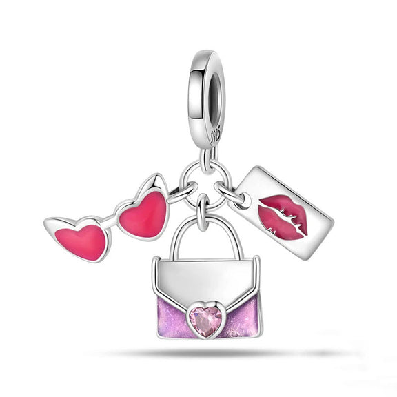 Sterling Silver Purse and Lipstick Charm - A sterling silver charm with a purse, sunglasses, and lipstick, accented with pink enamel, perfect for fashion-forward individuals.