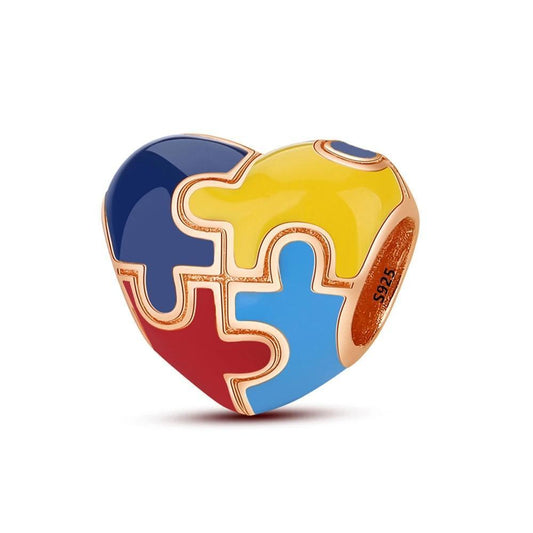 Puzzle heart charm with multi-colored enamel