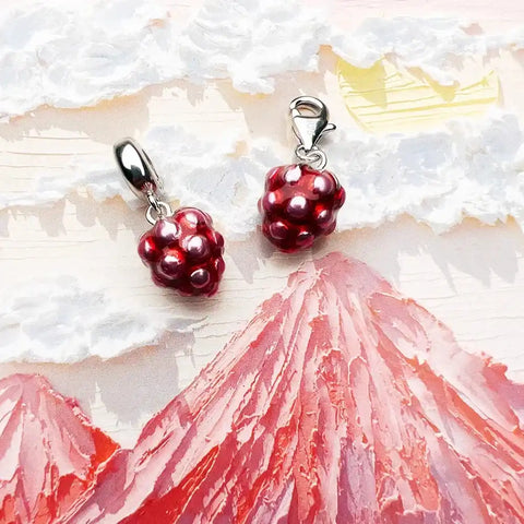 Raspberry charm pendants.