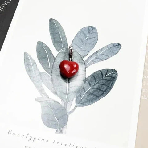Red heart pendant.