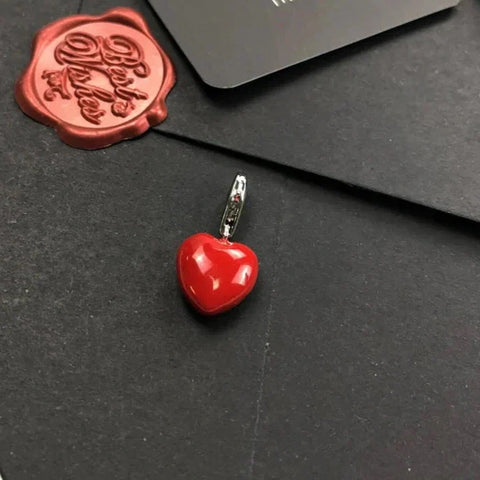 Red heart pendant.