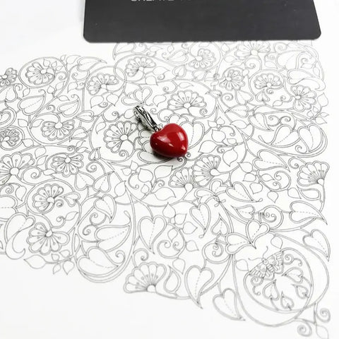 Red heart pendant.