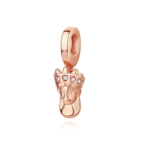 Rose Gold Baby Footprint Charm with Crystal Toes - A rose gold baby footprint charm pendant with clear crystal stones set across the toes, featuring a clip-on bail for attaching to charm bracelets