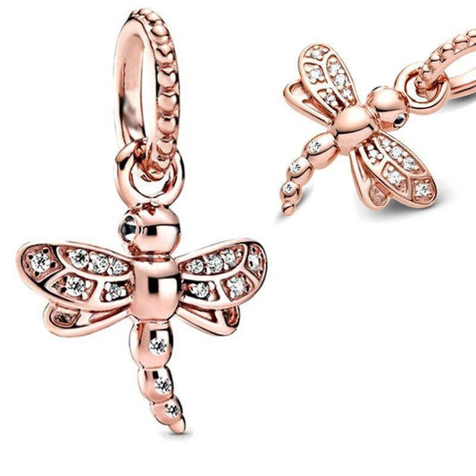 Rose gold dragonfly charm with crystal accents for a sparkling, elegant look.